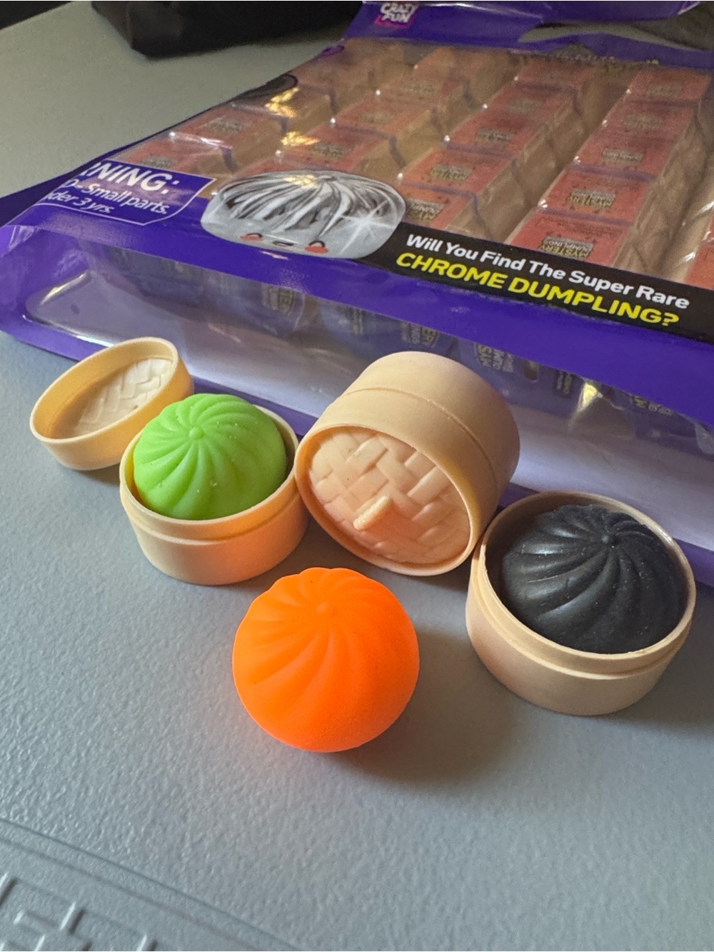 Crazy fun Extra mini mystery dumplings. Chrome edition